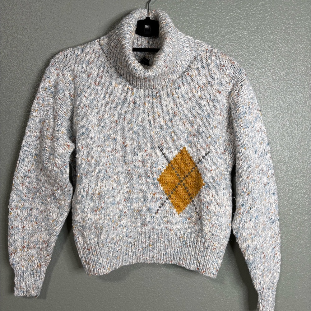 Elegant Speckled Turtleneck Sweater with Diamond Accent